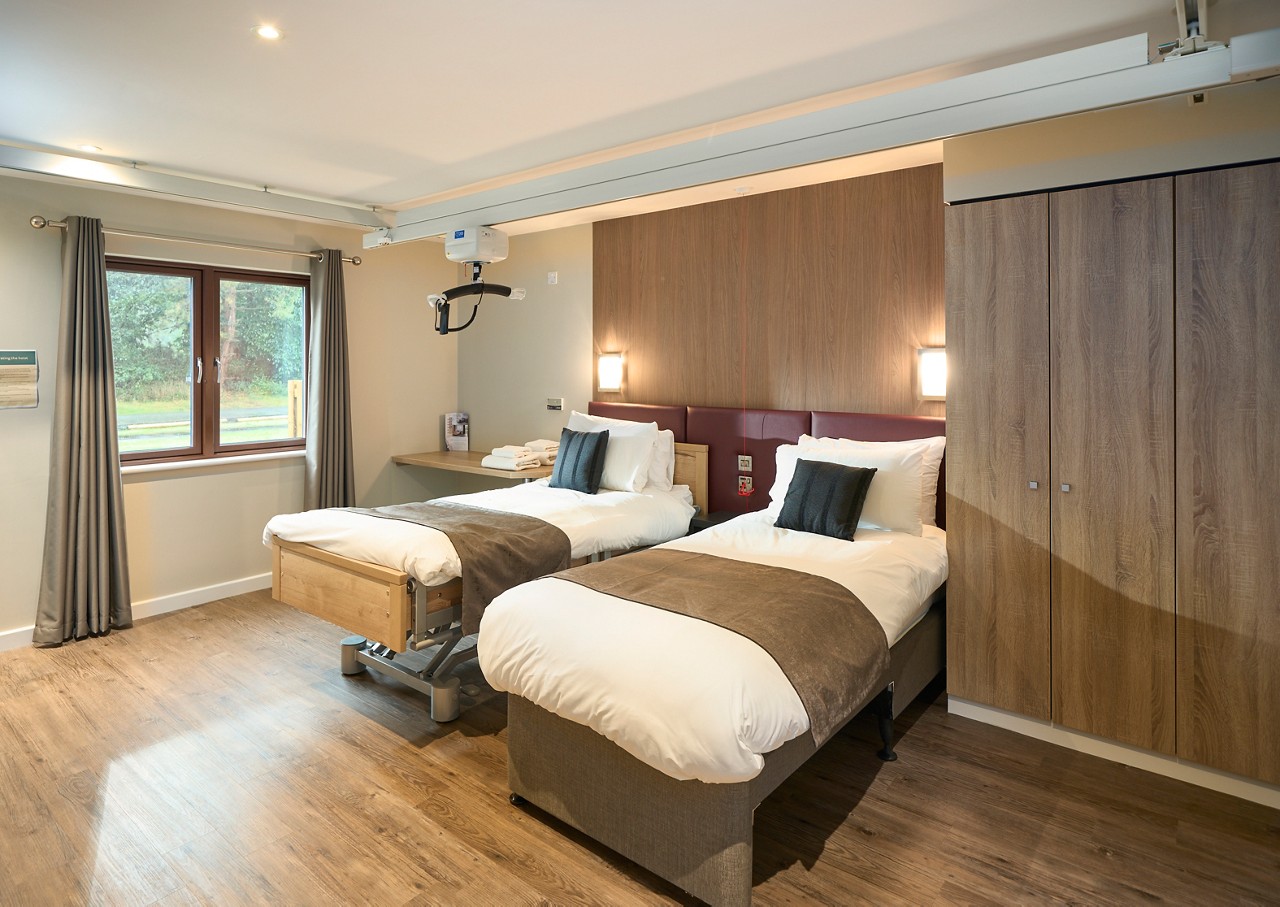 Three bedroom executive accessible lodge. Twin accessible bedroom.