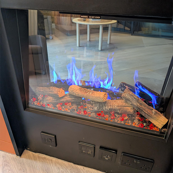 Image of blue flames on the electric fire.